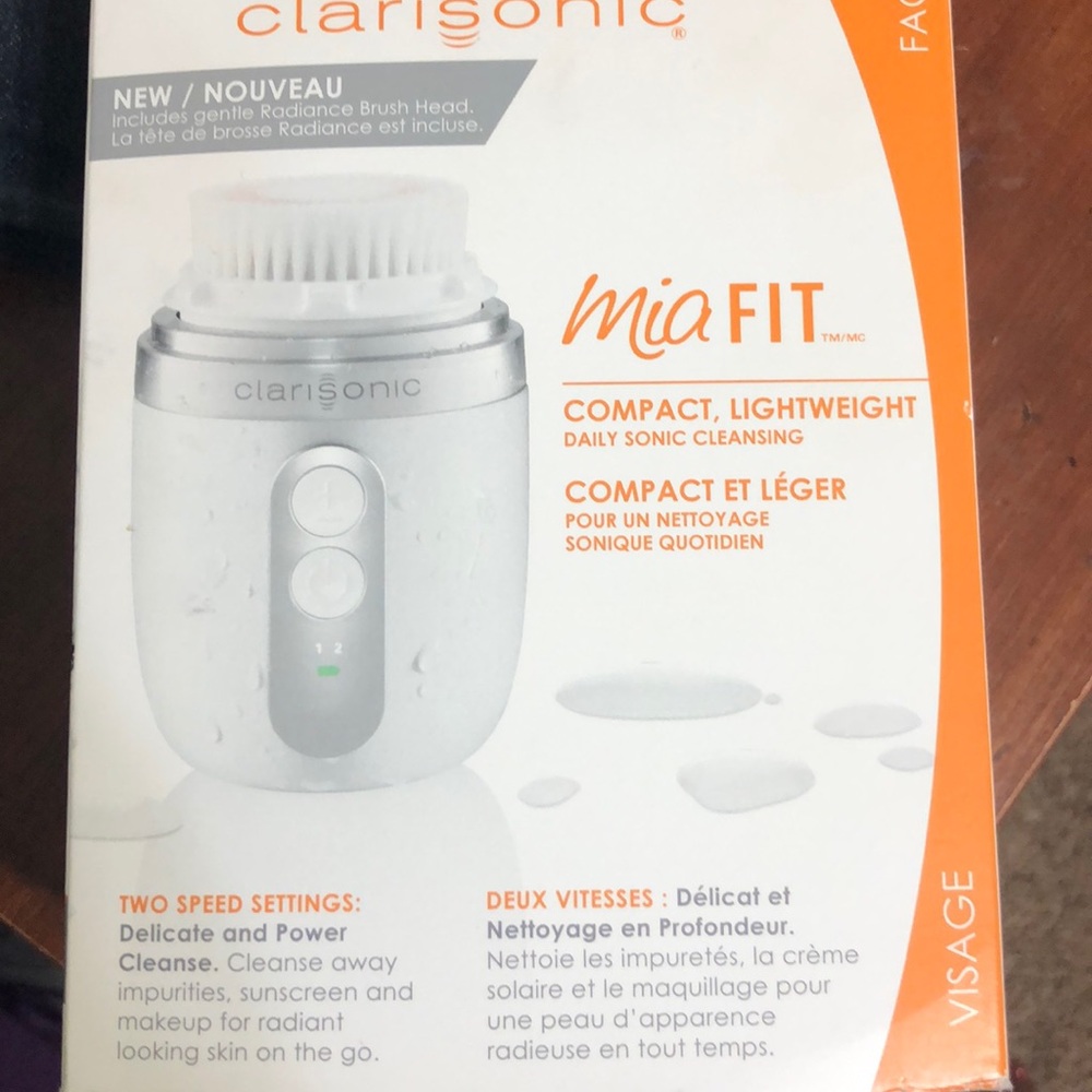 New Clarisonic Mia  Blue Sold Left with white.